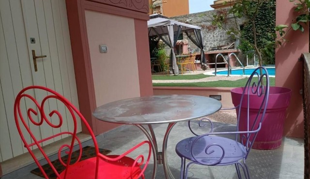 Downtown poolfront room with private veranda