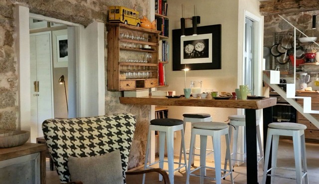 Elegant Pomegranate house immersed in the nature of the Island of Elba.