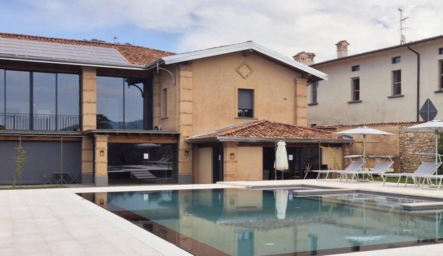 Elegant suite with porch and shared pool