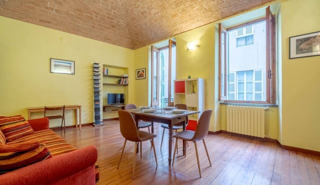 GuestHost - Comfortable and spacious apartment of 70sm, it can comfortably accommodate up to 4 people. The accommodation is located on the second floor of a medieval building without elevator (NOT suitable for disabled people - steps to access it). We ar