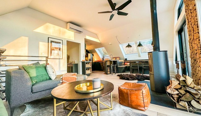 Modern barn perched on 24 acres w/stunning views of mountains & ski resort
