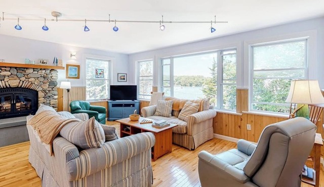 Secluded waterfront home with firepit, gas grill, kayaks, dock, balcony, & patio