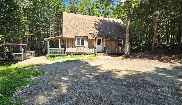 Spacious cabin on beautiful Long Lake w/waterfront view, private dock, fire pit.