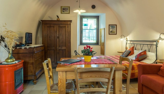 Studio-Apartment mit Balkon mit Seeblick und Zugang zum Garten by Interhome