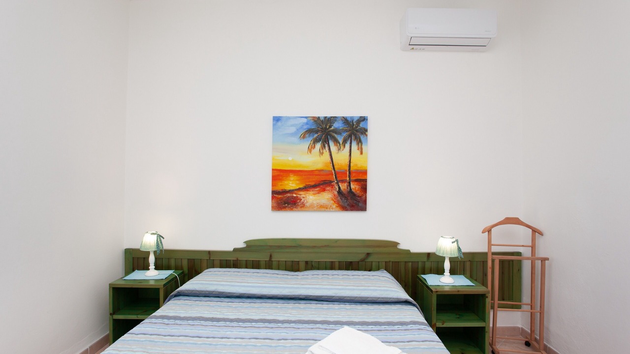 Photo of Bedroom in Cala Liberotto