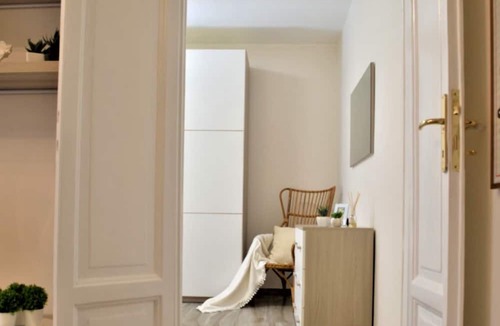 Lazzaretto Apartment | HomeLovers Bright and white house Porta Venezia Metro Station