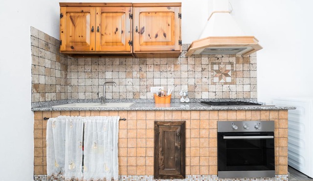 Apartment 'Casa Vacanza Nel Centro Di Irgoli' with Private Terrace, Wi-Fi and Air Conditioning
