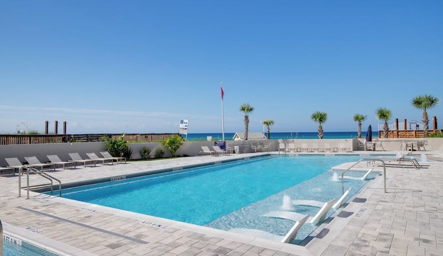 Rate Reduced! Updated Beachfront 1BR w/Dazzling Gulf View! Pool, Tram, Gym.